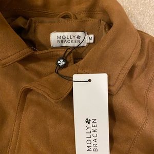 Molly Bracken, Size Medium, Camel cinched waist jacket.